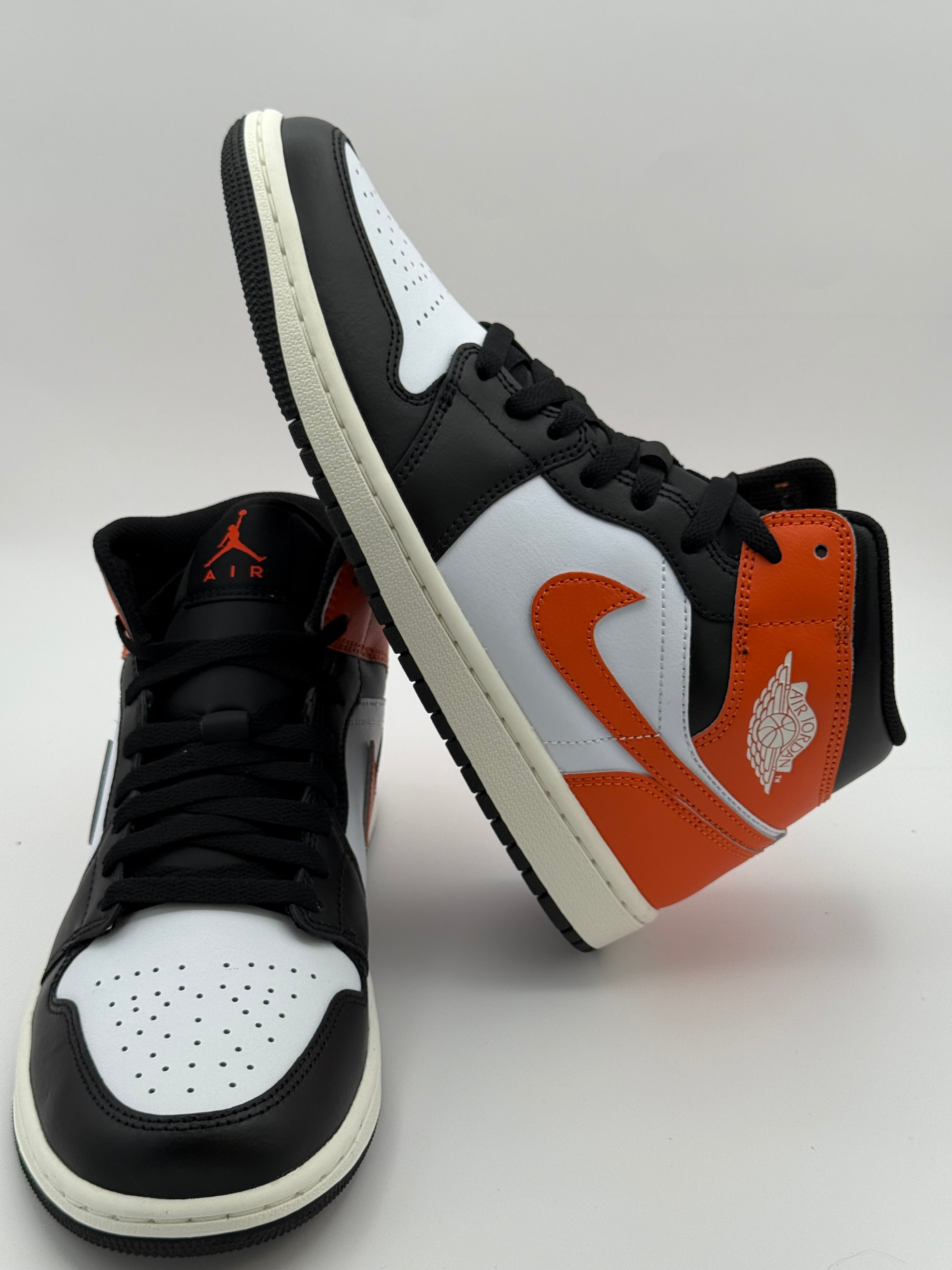 Air Jordan 1 Mid SE starfish “White/Black/Orange”