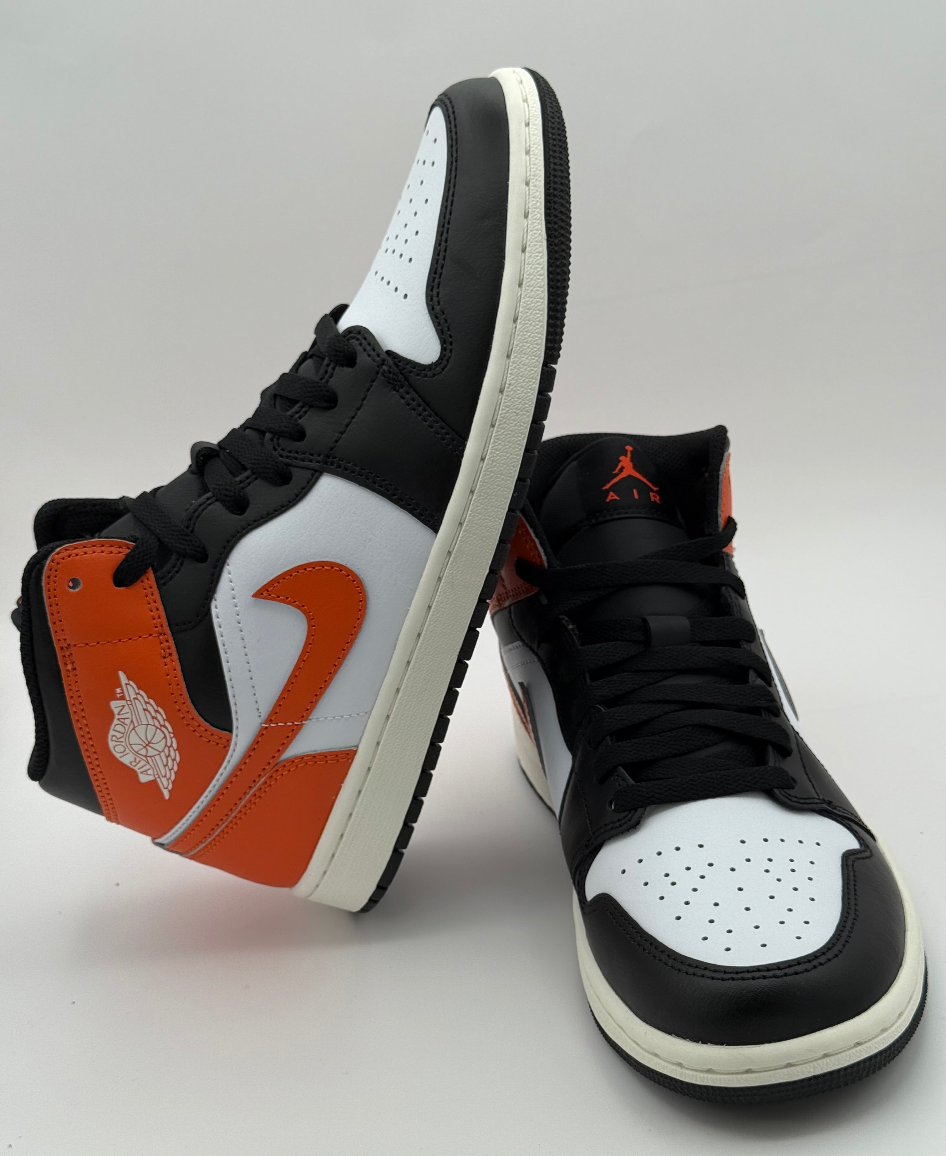 Air Jordan 1 Mid SE starfish “White/Black/Orange”